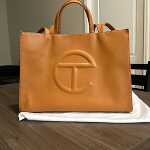 Medium tan Telfar bag barely used comes with duster